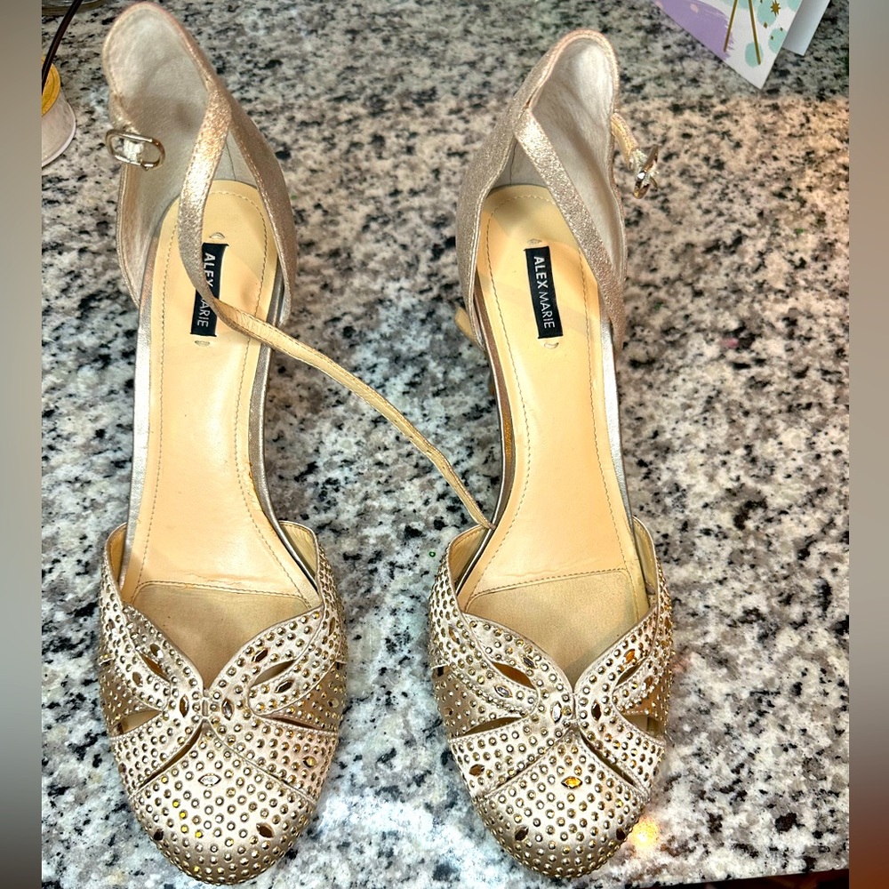 Size 11 Gold Heel. Used Alex Marie heels with bling.
